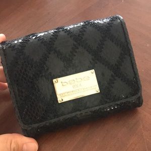 Authentic bebe black and gold wallet